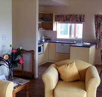 Poinciana Cottages - Accommodation Coffs Harbour