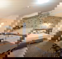 Highlander Motor Inn and Apartments - Accommodation Coffs Harbour