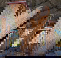 Collymongle Carved Trees - Accommodation Coffs Harbour