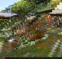 Palm Grove Rainforest Retreat - Accommodation Coffs Harbour