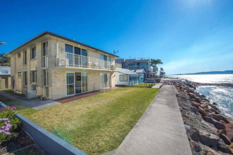 Alcheringa Unit 1 / 32 Sandy Point Road - Accommodation Coffs Harbour 0