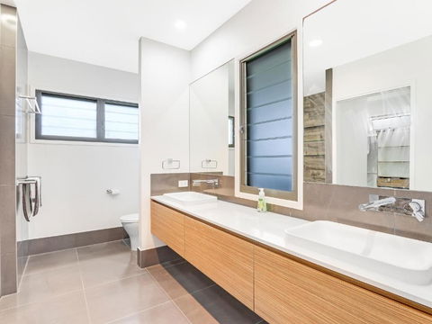 WATERFRONT HOME BORDERING MOOLOOLABA - Accommodation Coffs Harbour 1