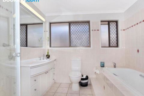Schirrmann 56 Four Bedroom Home On Canal With Pool Pontoon Aircon & WiFi! - Accommodation Coffs Harbour 0