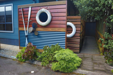 Strahan Bungalows - Accommodation Coffs Harbour 0