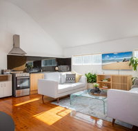 Sunlit Two-Bedroom Unit With Sprawling BBQ Deck - Accommodation Coffs Harbour