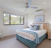 'Sandy Point Haven' 21a Sandy Point Rd - Stylish Haven with WIFI Air conditioning  Water views - Accommodation Coffs Harbour