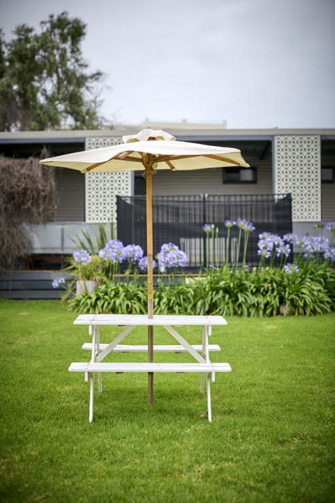 Coastal Oasis Charming Retreat Steps From Rye Beach - Accommodation Coffs Harbour 1