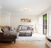 3-Bed Home with BBQ Patio near Parks and Playgrounds - Accommodation Coffs Harbour