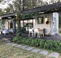 Absolute riverfront shipping container cabin - Accommodation Coffs Harbour